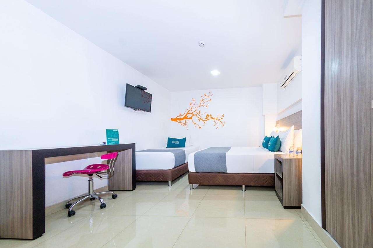 Ayenda 1136 Mh Hotel Pereira Buitenkant foto